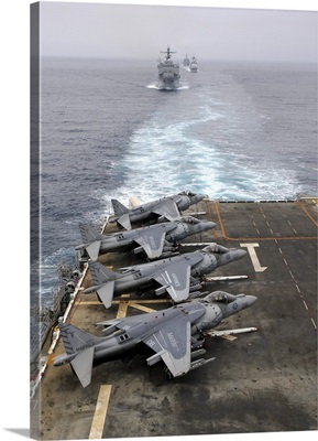 AV-8B Harriers line the flight deck of amphibious assault ship USS Tarawa