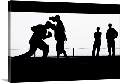 Aviation Boatswain's Mates Practice Boxing In The Hangar Bay