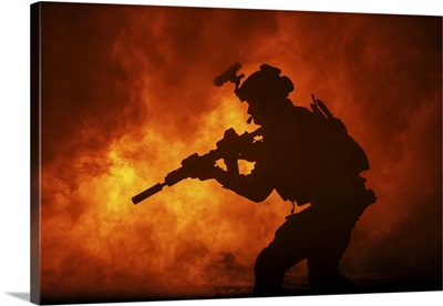 Black Silhouette Of Soldier In The Burning Fire During A Battle Operation