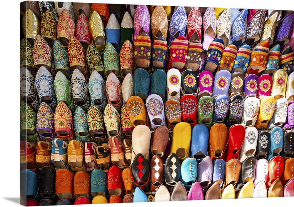 Brightly colored, handmade Moroccan slippers on display in  Fez, Morocco.