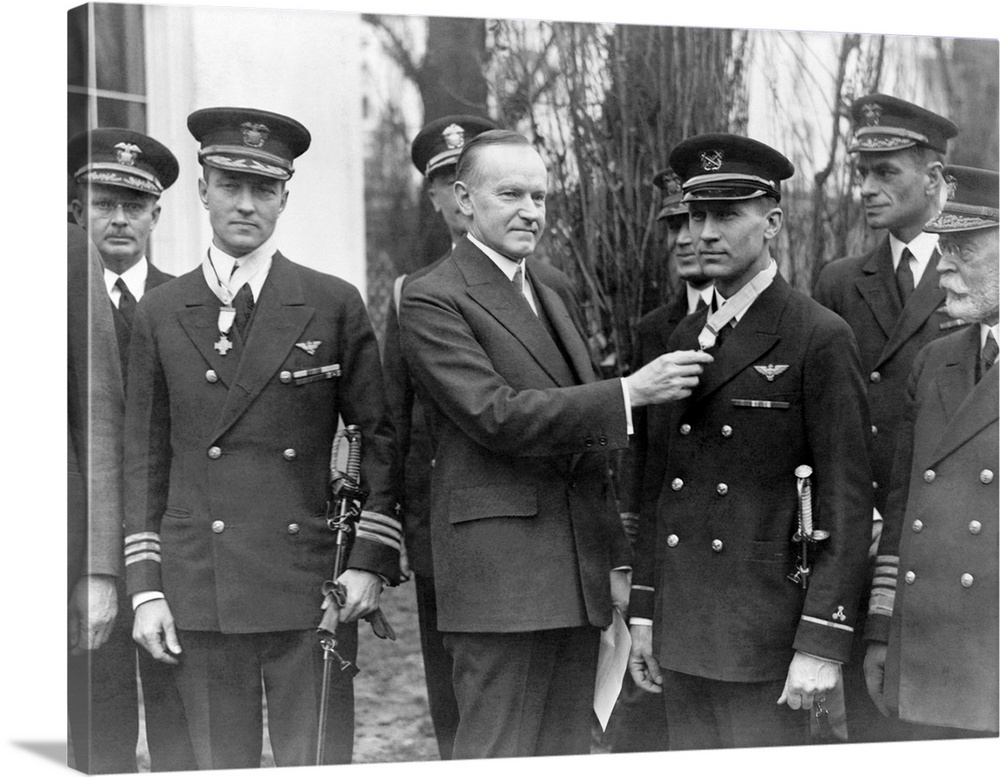 U.S. President Calvin Coolidge conferring the Congressional Medal Of Honor to Floyd Bennett and Richard Byrd.