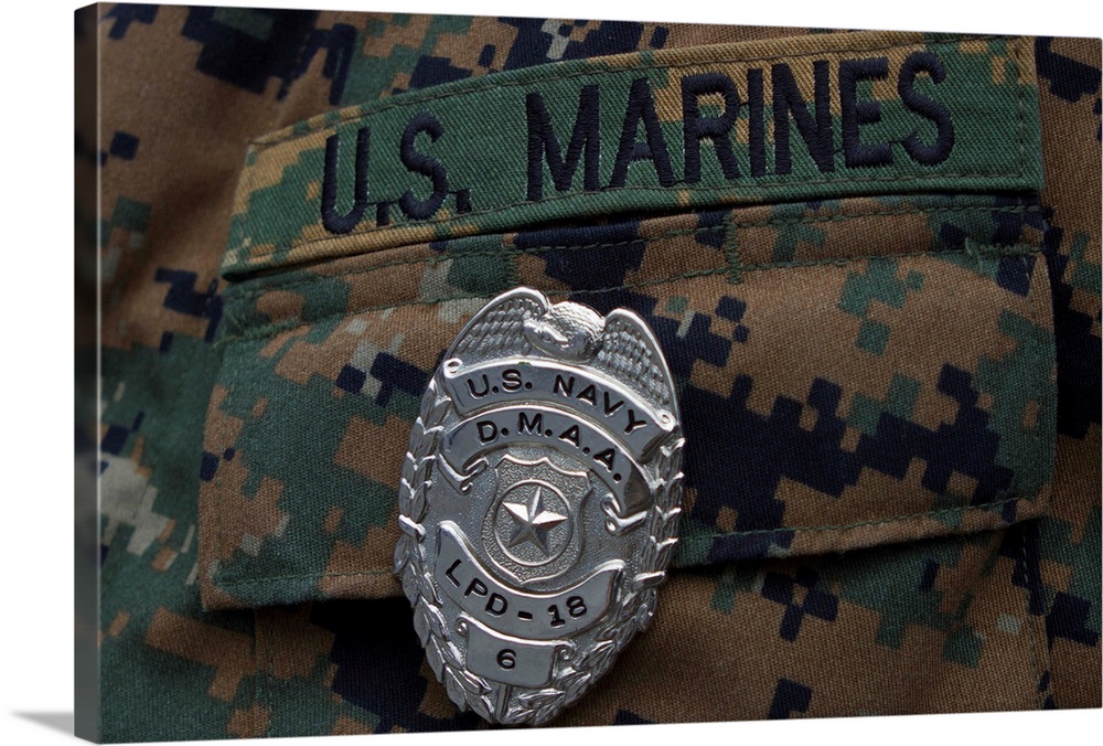 Close-up of a duty master-at-arms badge on the uniform of a U.S. Marine.