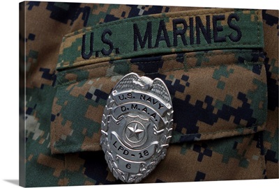 Close-up of a duty master-at-arms badge on the uniform of a US Marine
