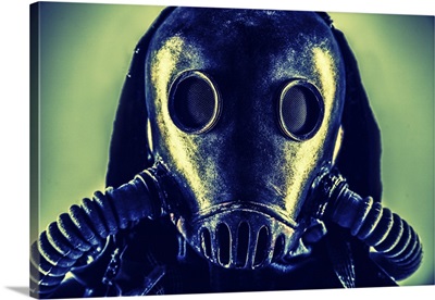 Close-Up Portrait Of Post-Apocalypse Survivor Wearing Rags And Full-Face Gas Mask