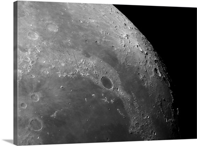 Close up view of the moon showing impact crater Plato