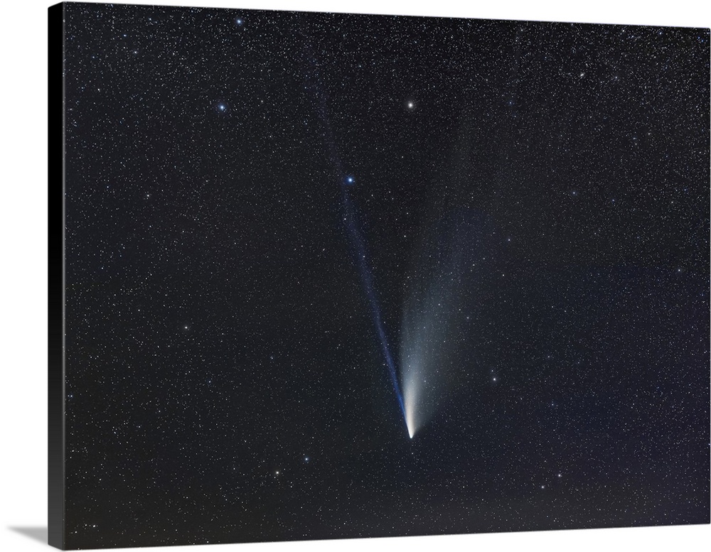 July 20, 2020 - Comet NEOWISE (C/2020 F3) in a tracked close-up showing the straight blue ion tail and the curving whitish...