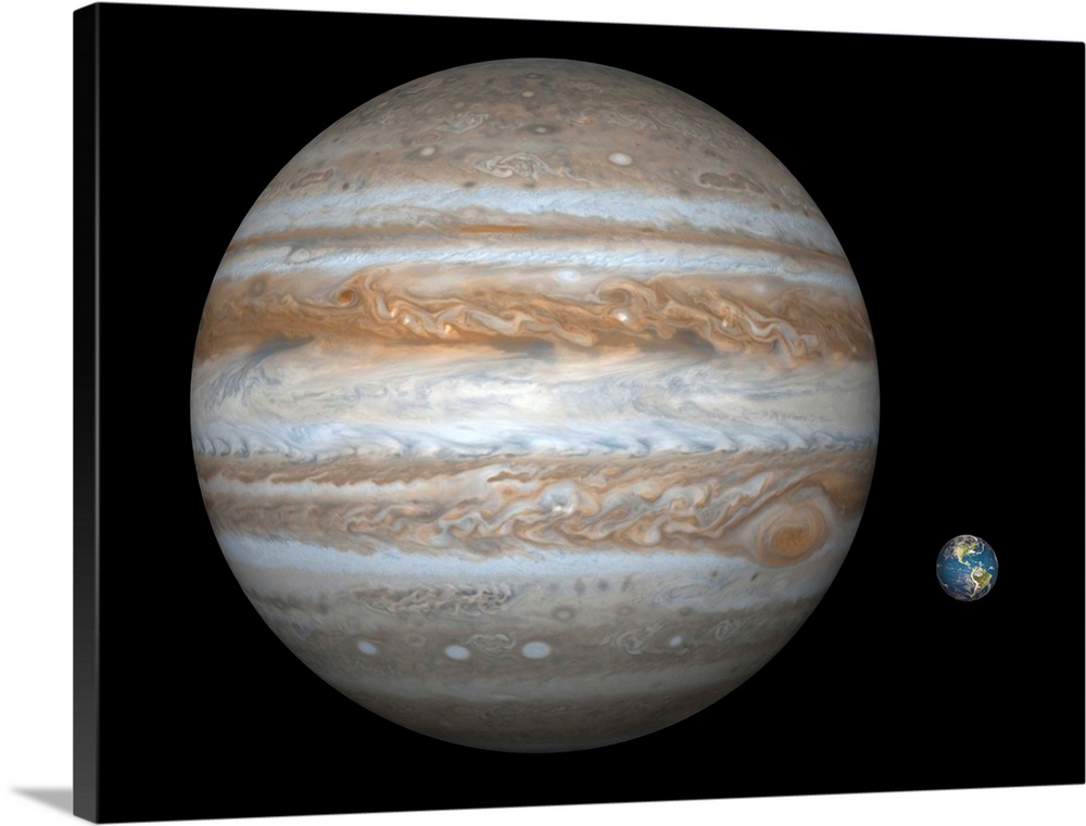 Artist's concept comparing the size of the gas giant Jupiter with that of the Earth.