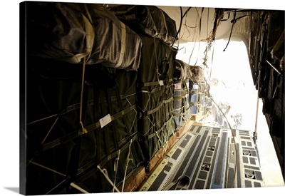 Container Delivery System Bundles Drop Out Of A C-17 Globemaster III In Afghanistan
