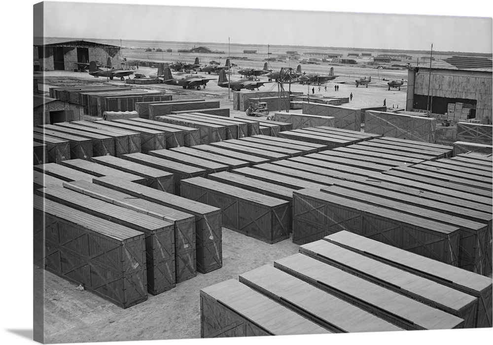 March 1943 - Crated fighter planes awaiting assembly at a delivery point of American warplanes to Russia somewhere in Iran.