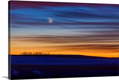 Crescent Moon In Colorful Twilight And Sunset Clouds, Alberta, Canada