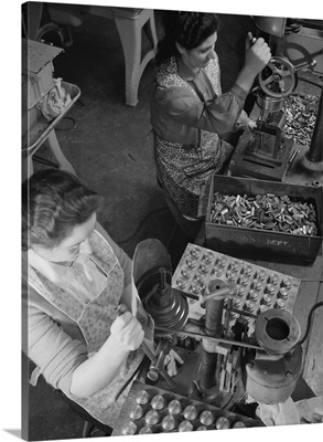 Drilling pressure pinholes and center holes in the spring collets