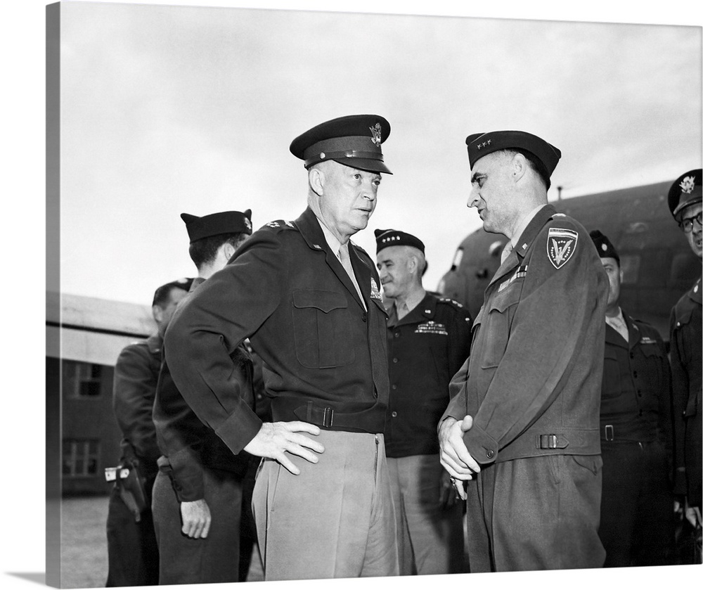 General Dwight Eisenhower talking with General Lucius Clay at Gatow Airport in Berlin, Germany, 1945.