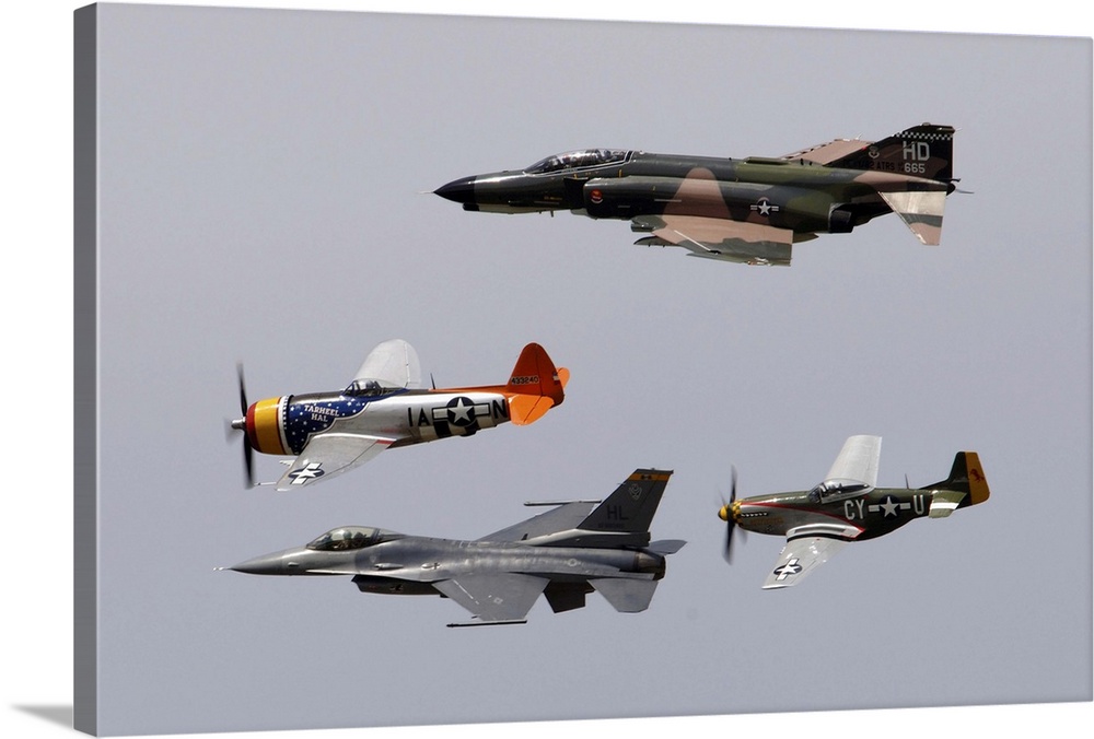 An F-4 Phantom, P-47 Thunderbolt, F-16 Fighting Falcon and P-51 Mustang fly in a heritage flight.