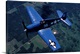 image thumbnail of F-6F Hellcat flying over Oshkosh, Wisconsin.