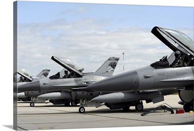 F16 Fighting Falcons await to launch for a training mission