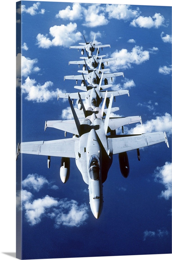 F/A-18C Hornet aircraft fly in formation during Operation Desert Shield.