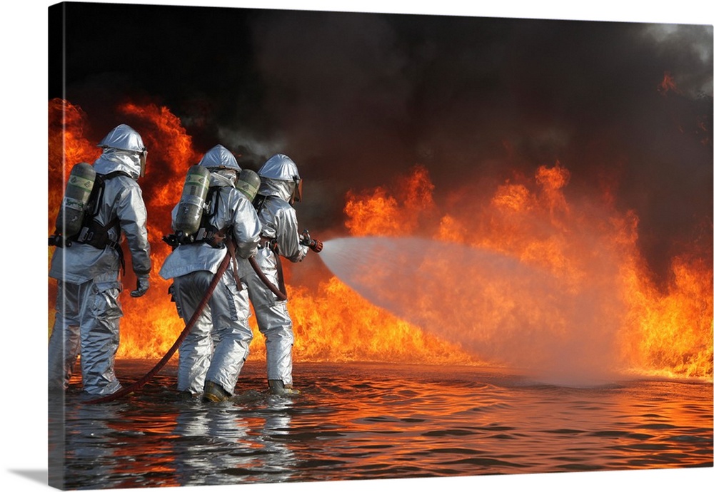 Firefighting Marines battle a huge blaze.