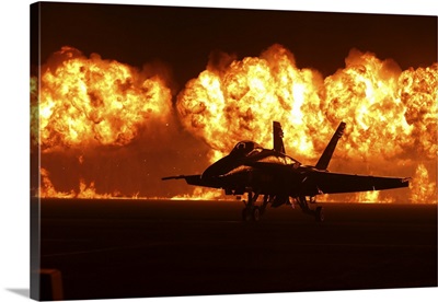 Flames Explode Behind An F/A-18 Hornet Of The U.S. Navy Blue Angels