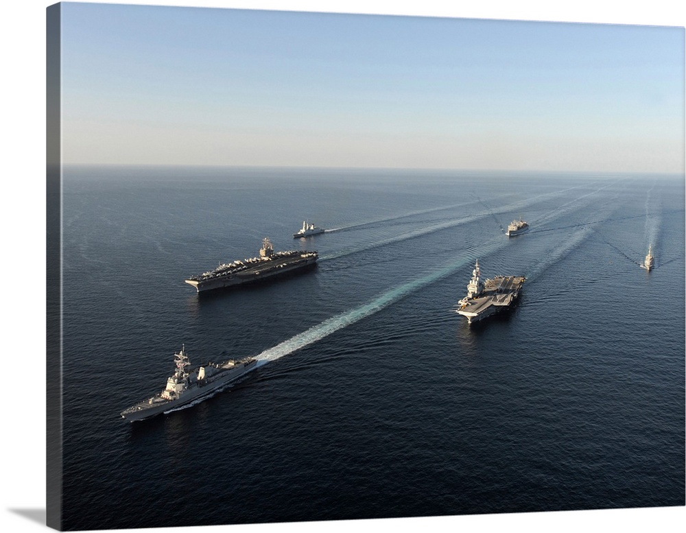 Fleet of Navy ships transit the Arabian Sea.