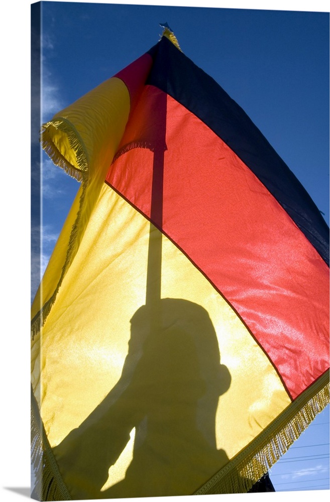 German Air Force Airman holds the German flag.