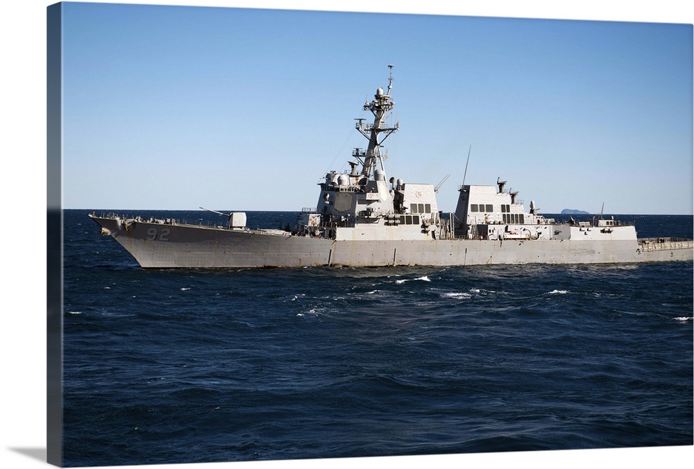 July 24, 2013 - The guided-missile destroyer USS Momsen (DDG-92) transits the Coral Sea during exercise Talisman Saber 2013.