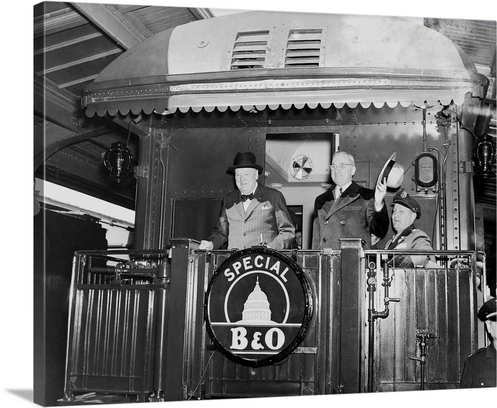 President Harry Truman and Prime Minister Winston Churchill on the rear platform of a train, circa 1945.