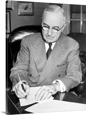 Harry Truman Signing A Document Allowing American Involvement In The Korean War, 1950
