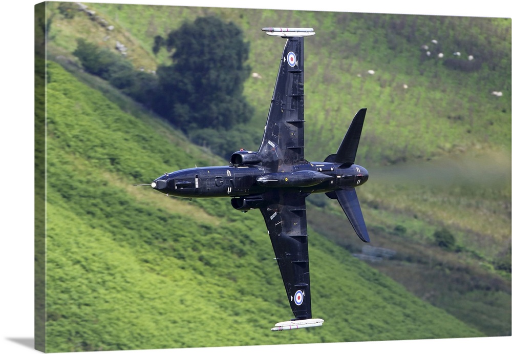 Hawk T2 training aircraft of Royal Air Force during training flight in the Machynlleth loop area, Wales, United Kingdom.