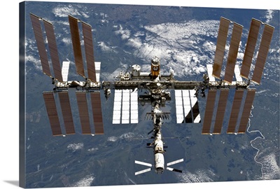 International Space Station backgropped by a blue and white Earth