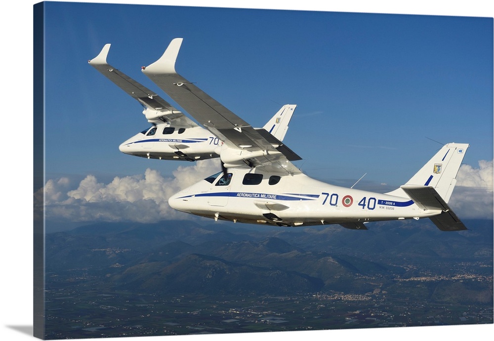 Italian Air Force Tecnam T-2006 trainers from 70th Stormo in-flight.