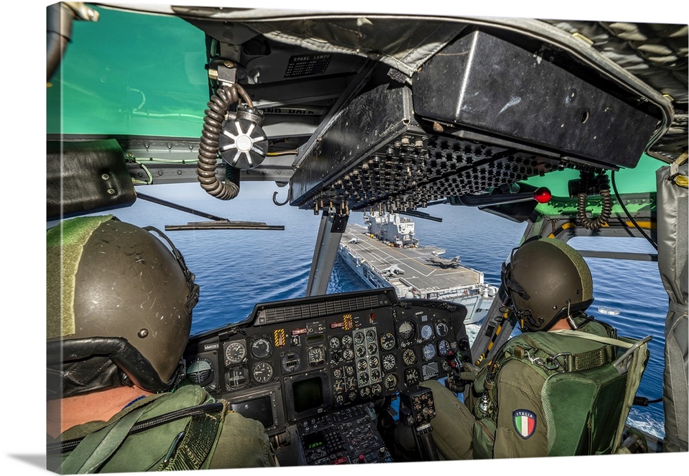Italian Navy AB-212 ASW Helicopter Flying Above The ITS Cavour Aircraft Carrier