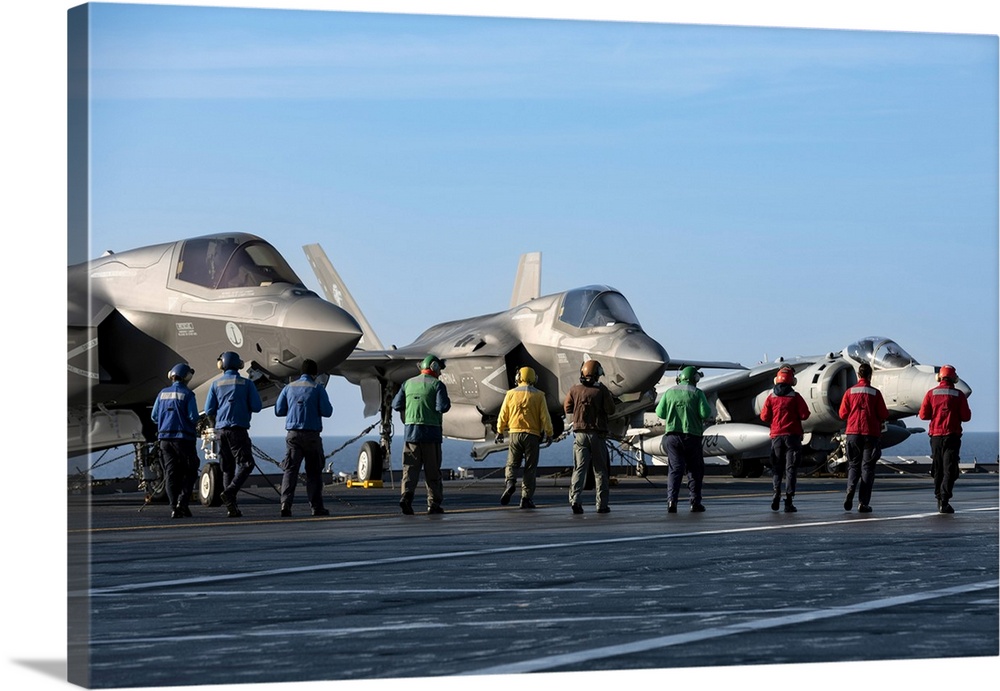 Italian Navy Personnel On The Deck Of The ITS Cavour Aircraft Carrier