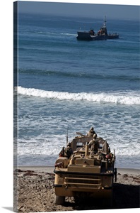 Marines anticipate the arrival of an Improved Navy Lighterage System image thumbnail