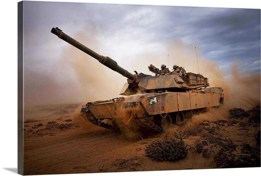 Marines roll down a dirt road on their M1A1 Abrams Main Battle Tank during a day of training at Exercise Africa Lion 2012.
