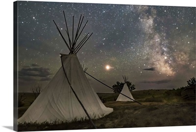 Mars And The Milky Way Over The Tipis In Grasslands National Park, Saskatchewan, Canada