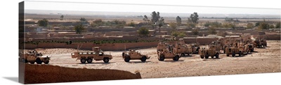 Military vehicles parked outside Loy Karez, Kandahar province, Afghanistan