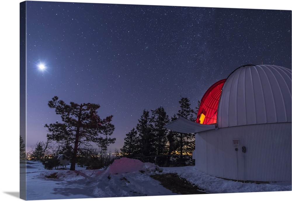 The moon lights up the observatory containing the Schulman telescope on Mount Lemmon during their Skycenter public outreac...