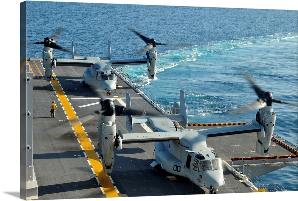 MV-22 Osprey aircraft land aboard USS Peleliu.