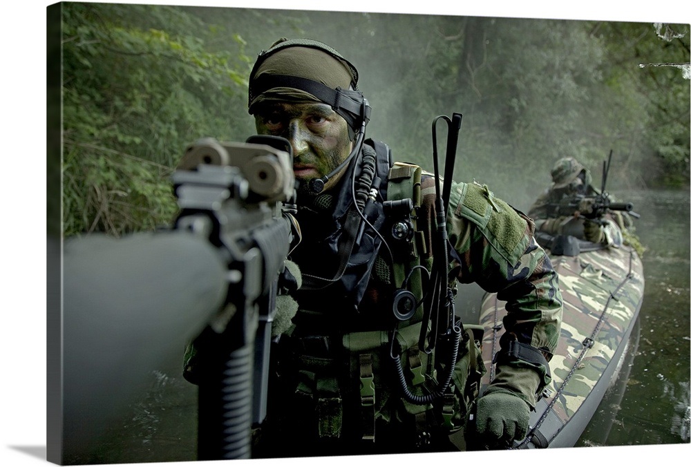 Navy Seals Navigate The Waters In A Folding Kayak During Jungle Warfare