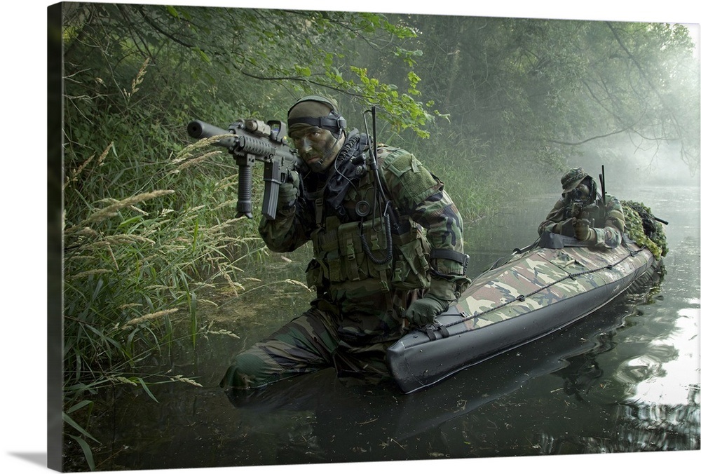 navy-seals-navigate-the-waters-in-a-folding-kayak-during-jungle-warfare