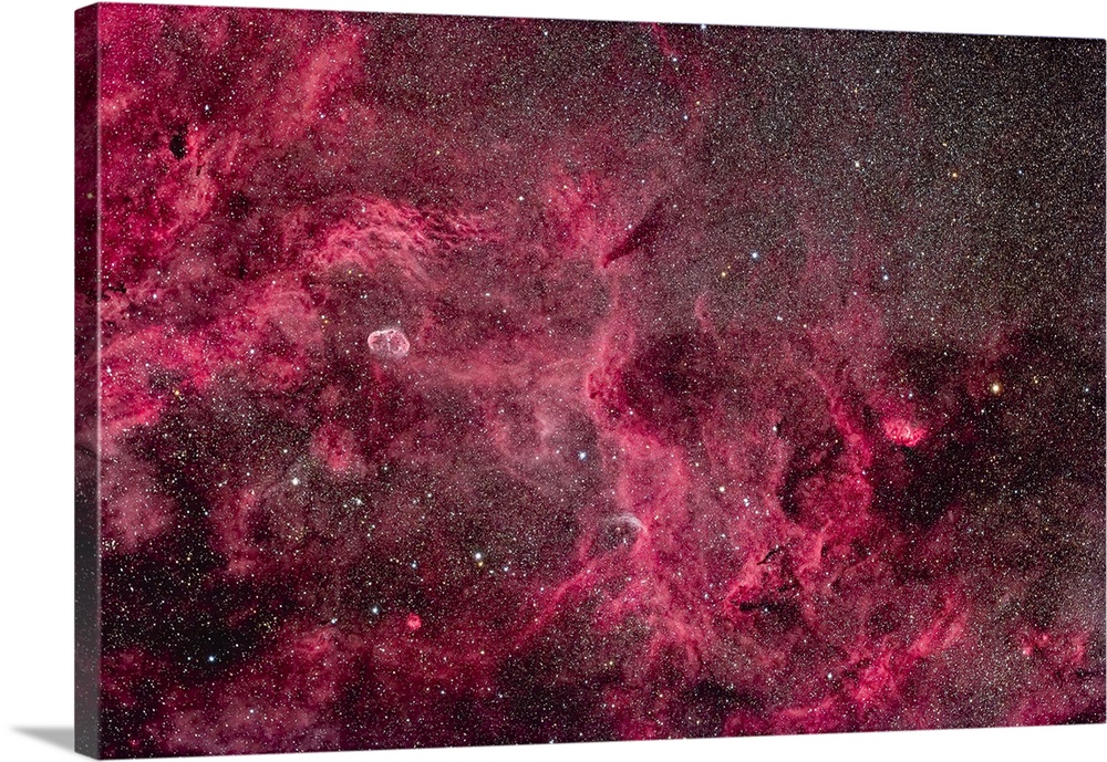 A rich area of nebulosity in central Cygnus that includes the Crescent Nebula and Tulip Nebula