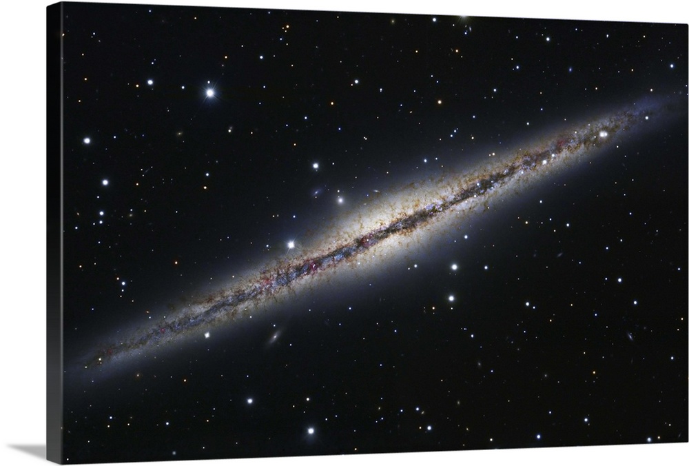 NGC 891, an edge-on spiral galaxy in Andromeda.