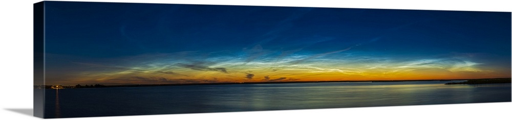 Panorama showing the full noctilucent cloud display over Crawling Valley Reservoir in Alberta, Canada