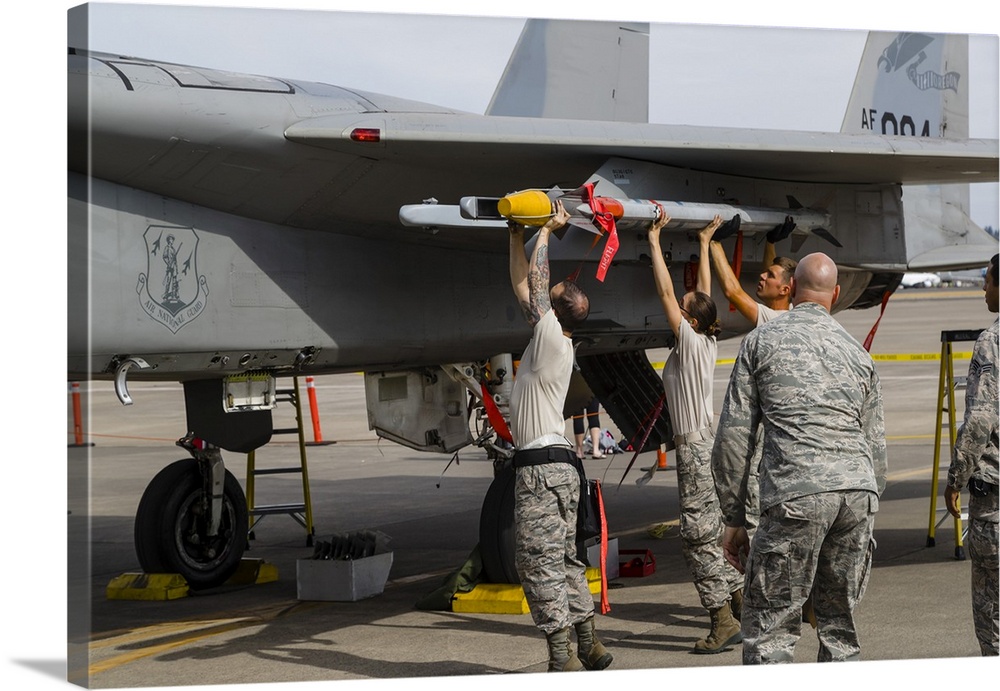 Oregon Air National Guard crews load missiles on to a F-15C Eagle at Portland International Airport, Oregon.