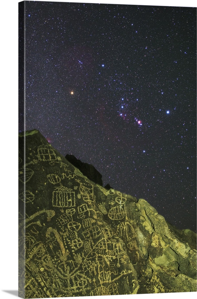Orion rises above the Bishop petroglyphs (rock art), California, USA.