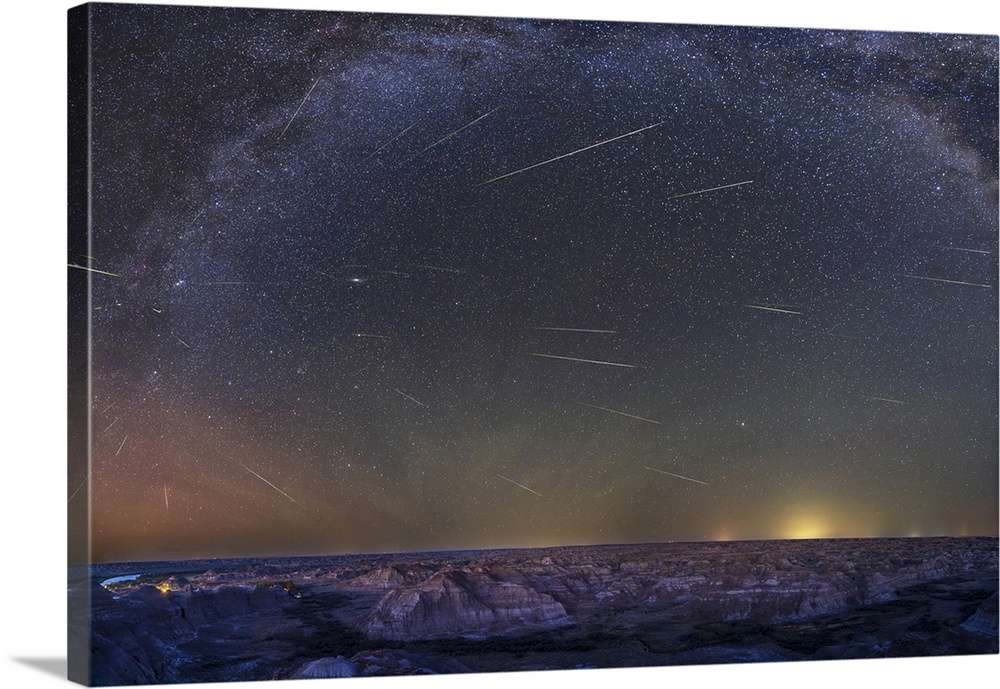 Perseids meteor shower panorama over the badlands of Dinosaur Provincial Park in Alberta, Canada