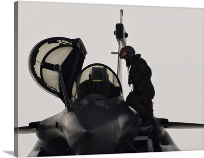 Pilot Checking The Cockpit Of His French Air Force Rafale