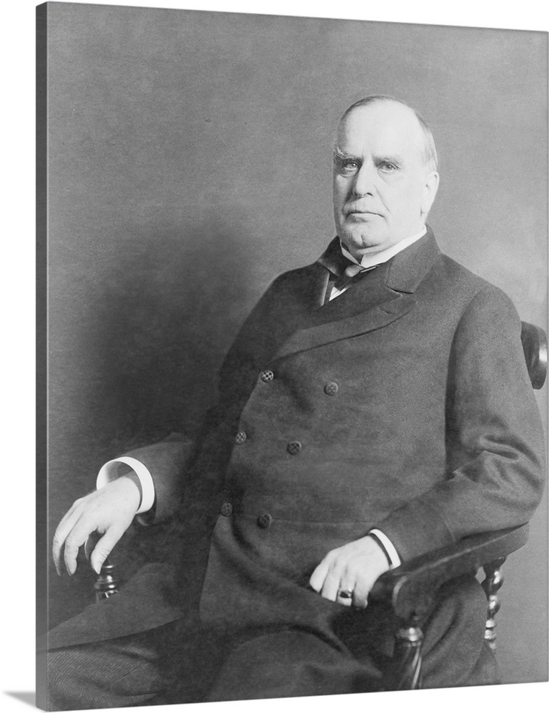 President William C. McKinley, three-quarter length portrait, seated, facing left, circa 1900.