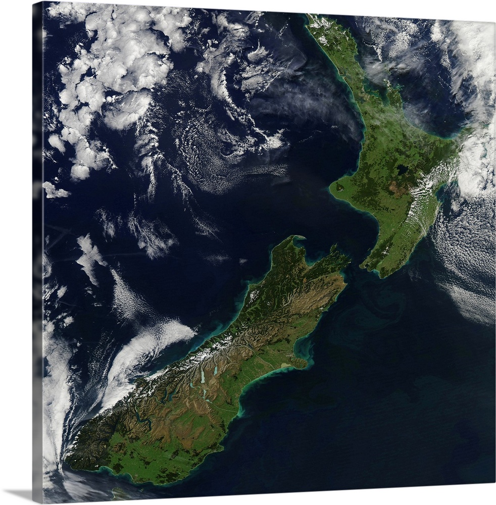 March 30, 2011 - Satellite view of New Zealand. Near the top of the image, snow covers the highest peaks of the North Auck...
