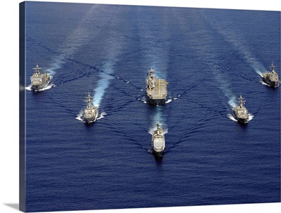 Ships of the Nassau Strike Group transit westward in the Atlantic Ocean